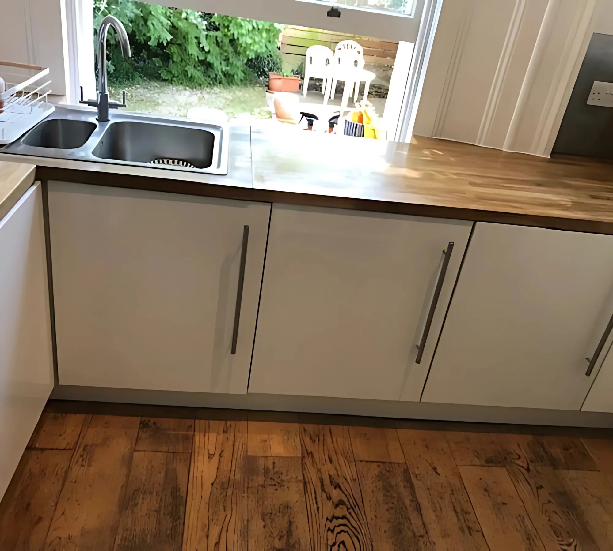 Double sink with backyard view