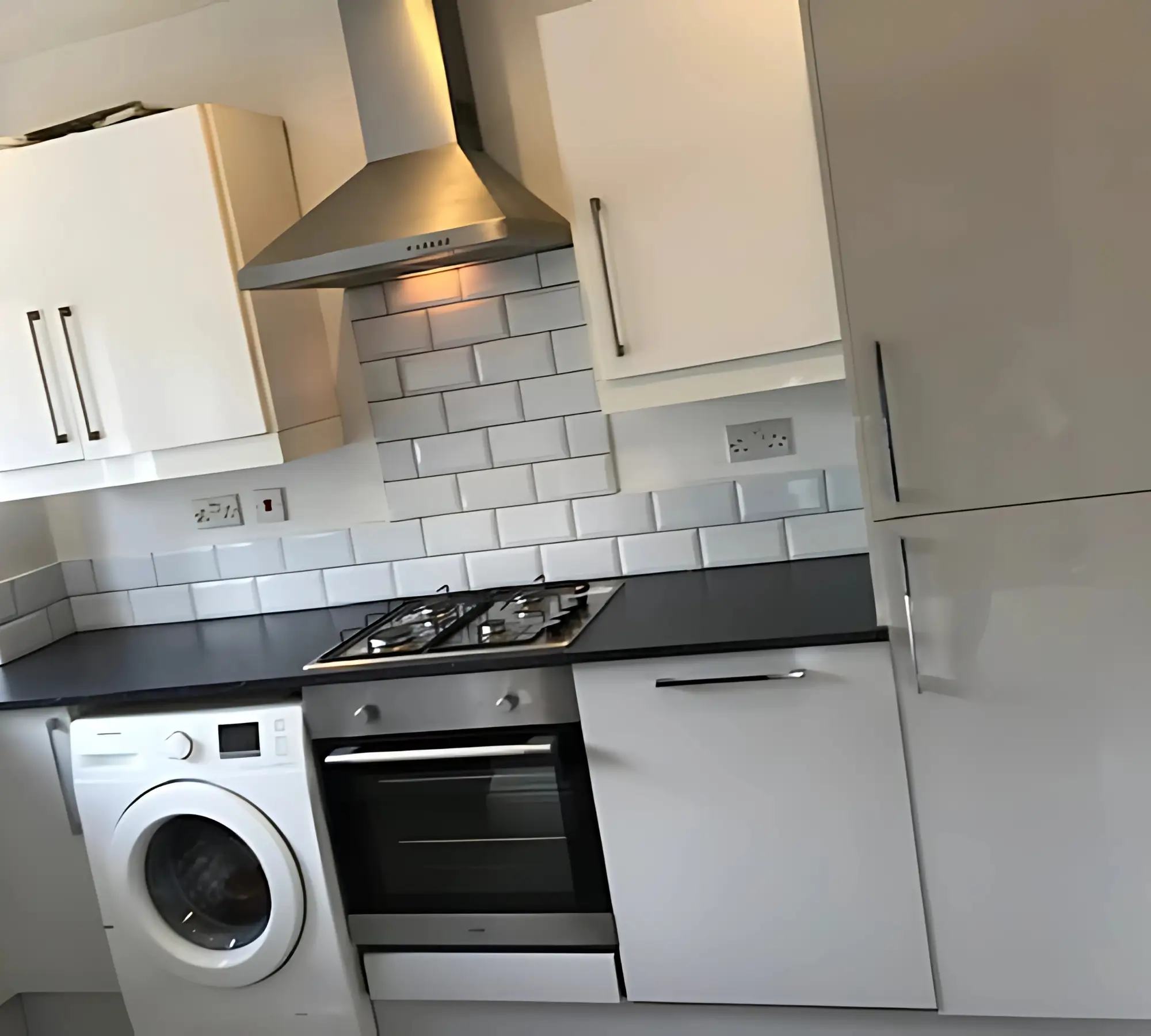 Modern kitchen with white cabinets