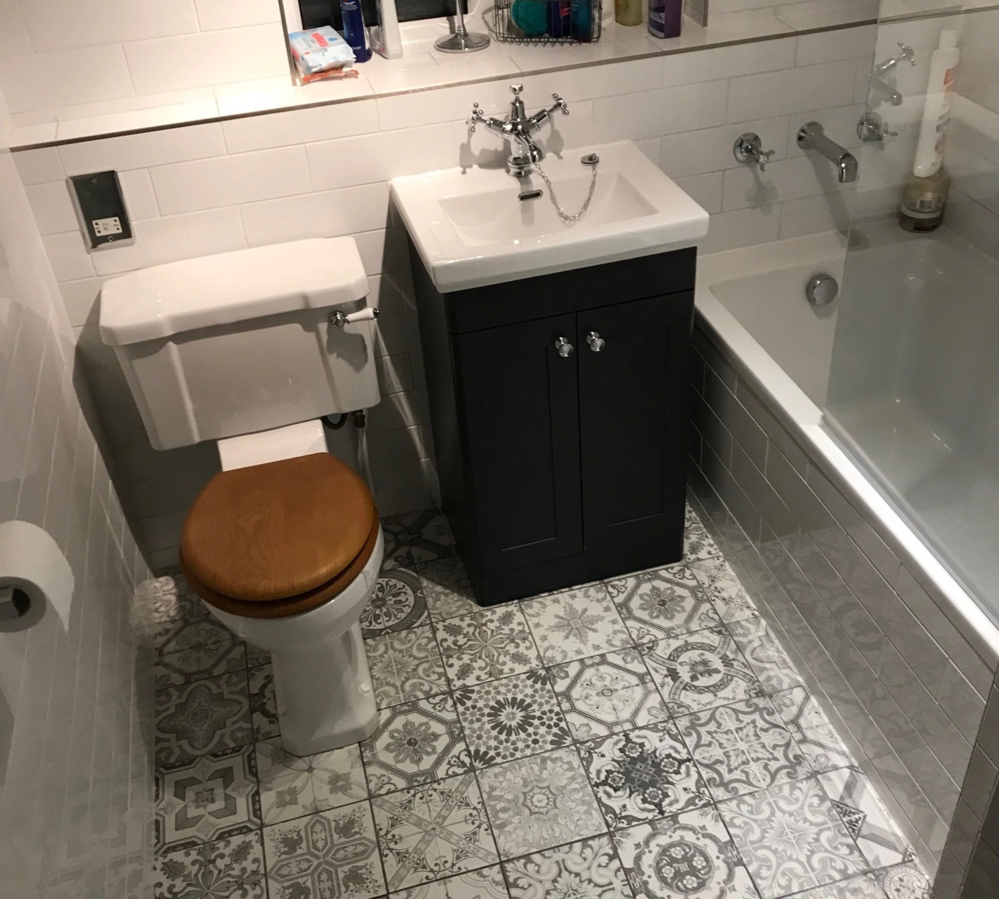 Small bathroom with dark vanity