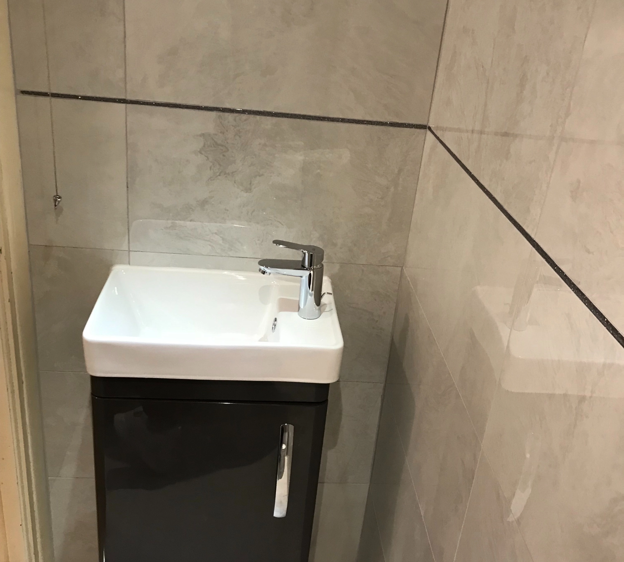 Small bathroom sink with faucet
