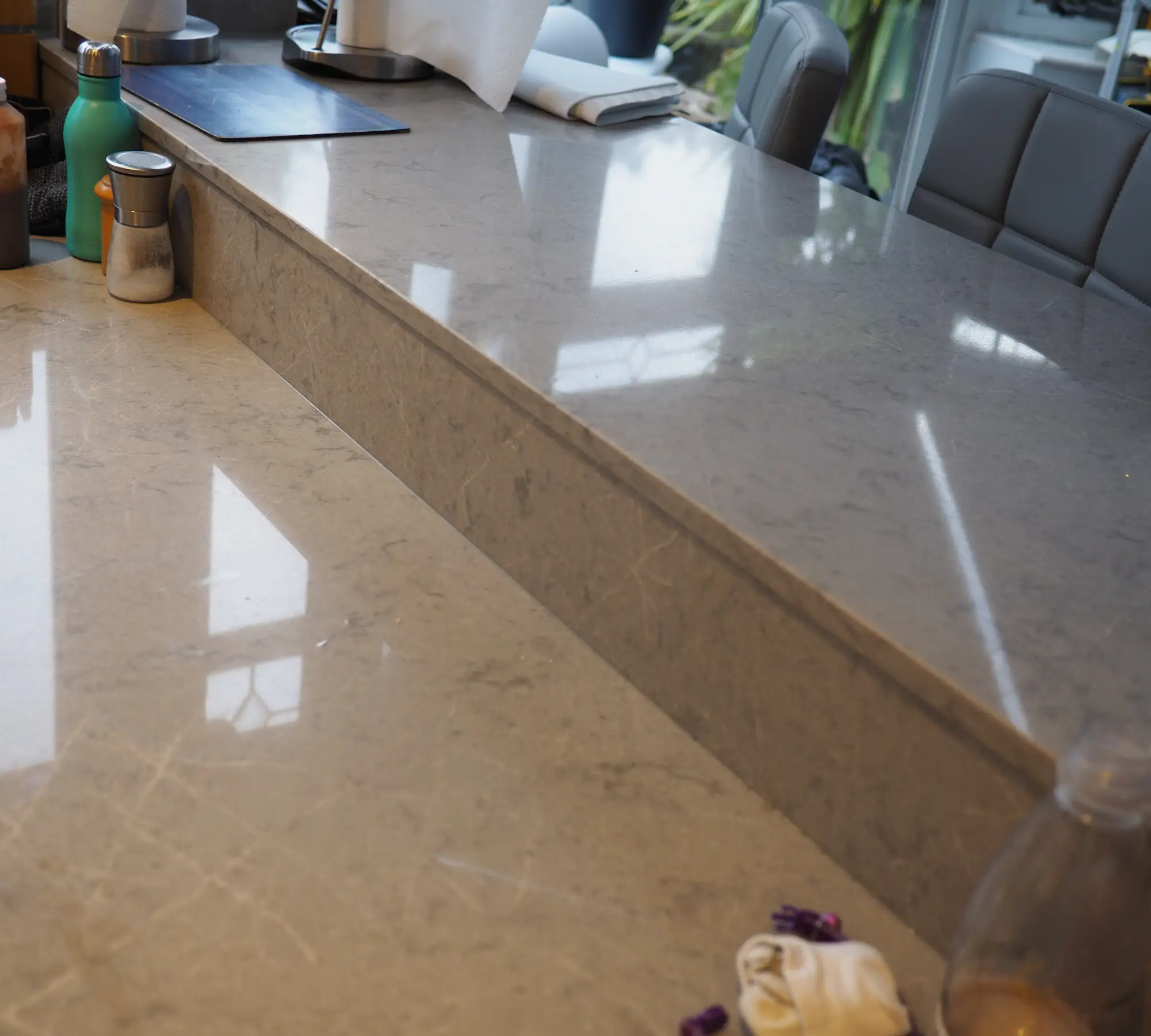 Glossy countertop with bar seating